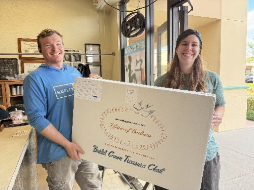Happy Couple with Wedding Gown Box Happy Couple with Wedding Gown Box